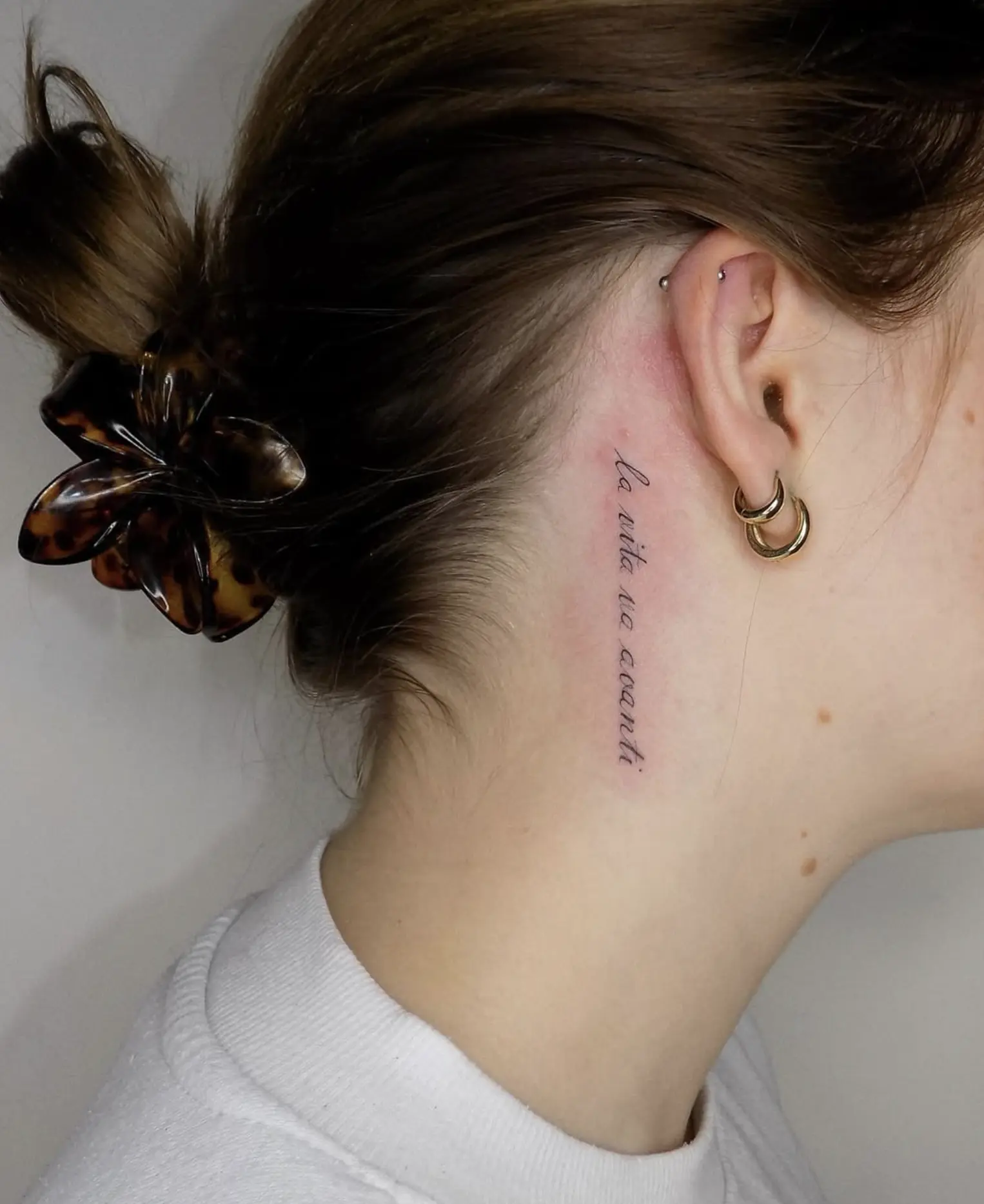 patchy or faded fine line tattoo